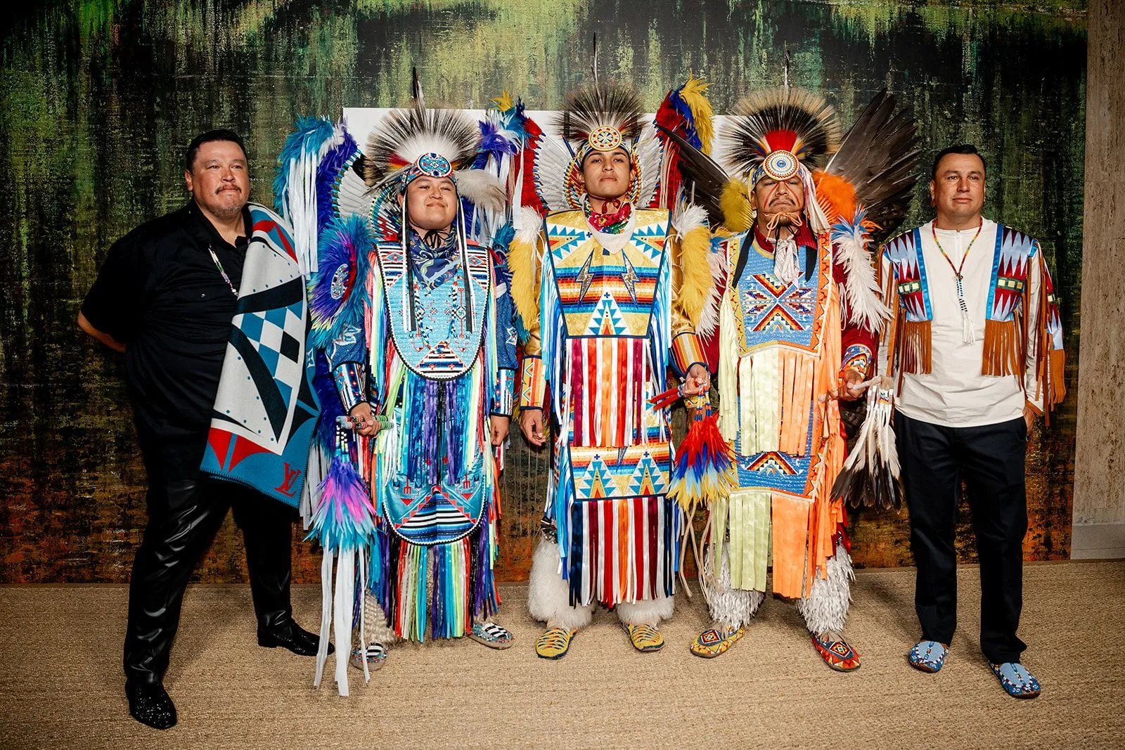 Dee Jay Two Bears and Standing Rock performers in ceremonial dress at THE NAT GALA.