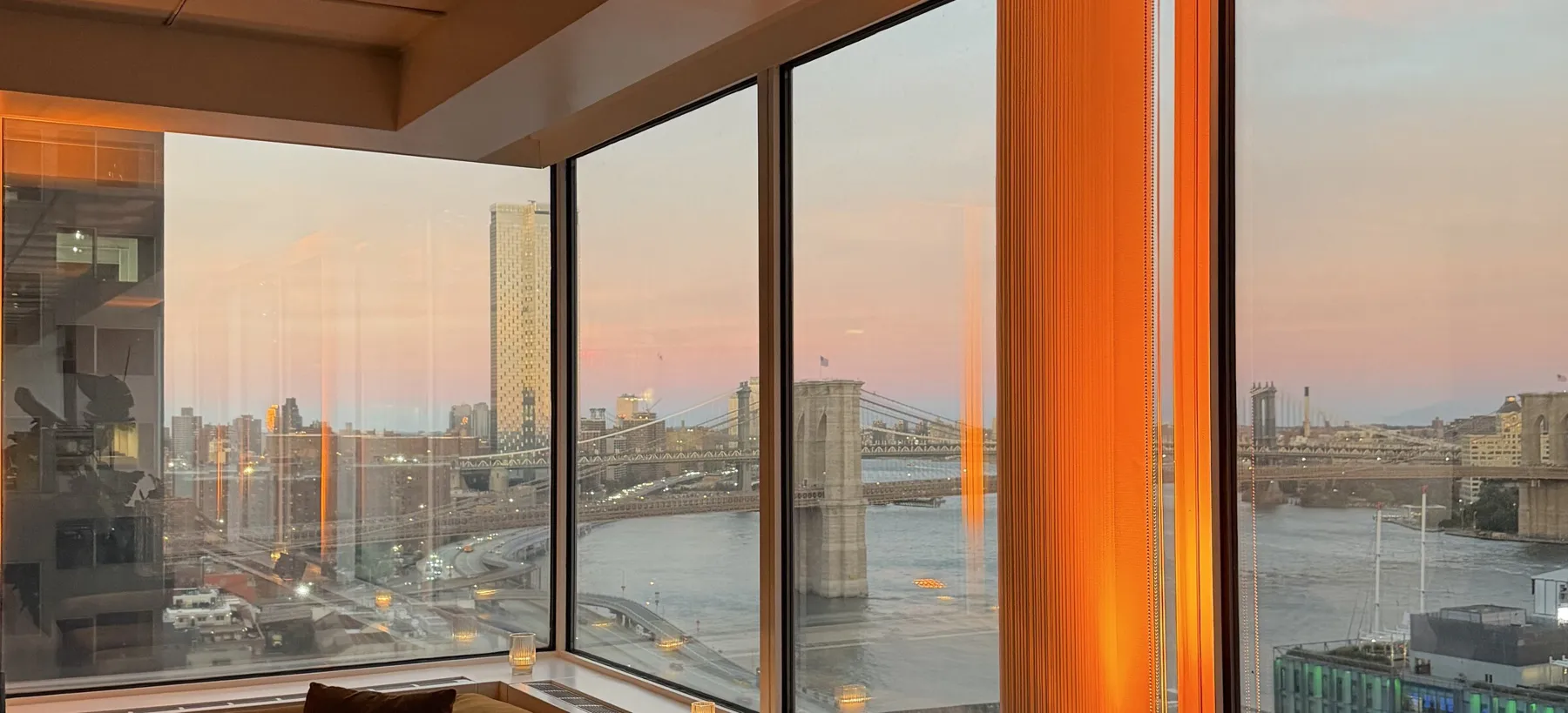 Sunset over the East River seen through the windows at WSA, Water Street.